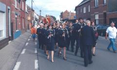 Reuzen van de "Katte" op stap met de harmonie Vredekring tijdens de Katte kermis  2006