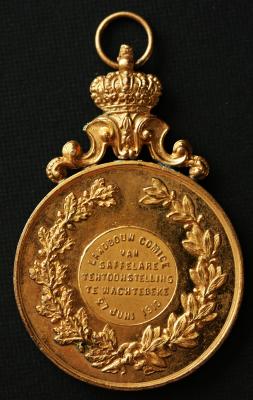 Foto van een medaille verkregen op een jaarmarkt