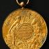Foto van een medaille verkregen op een jaarmarkt