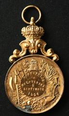 Foto van een medaille verkregen op een jaarmarkt