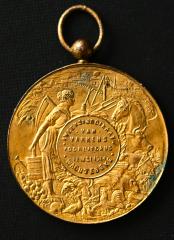 Foto van een medaille verkregen op een jaarmarkt